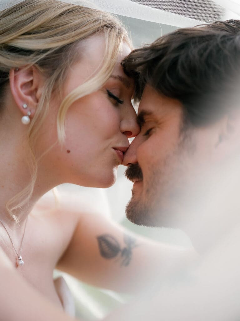 Dana and Jack embracing during romantic couple portraits in Texas