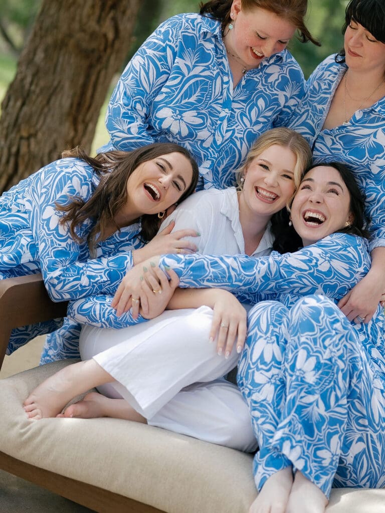 Bride Dana getting ready with her bridesmaids on her wedding morning