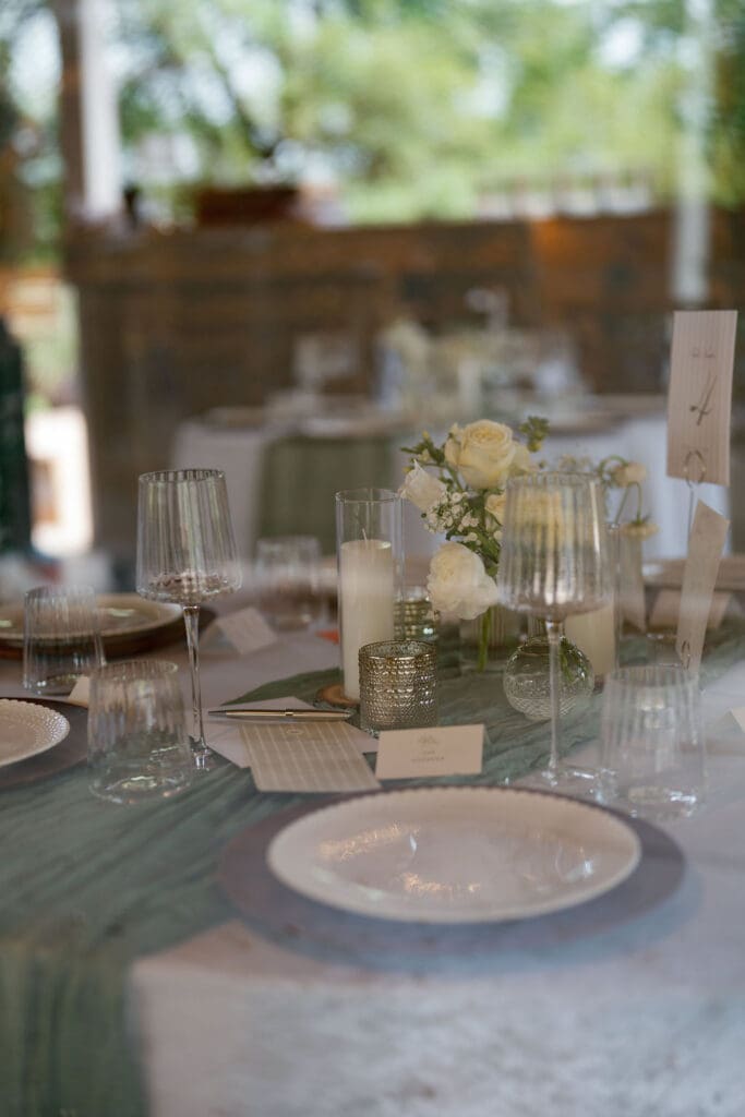 Elegant reception table settings with soft, romantic decor