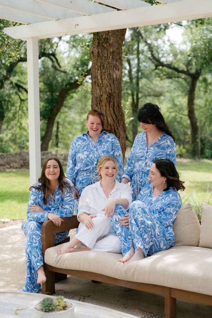 Bride Dana getting ready with her bridesmaids on her wedding morning