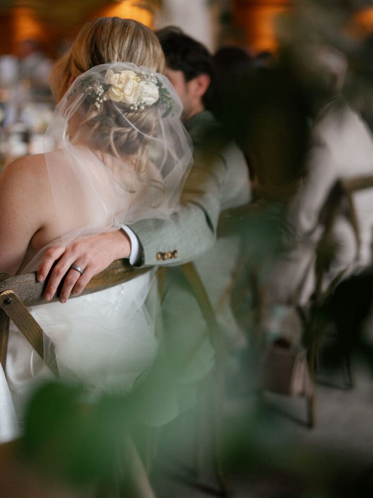 Happy couple sharing a quiet moment during the reception celebration