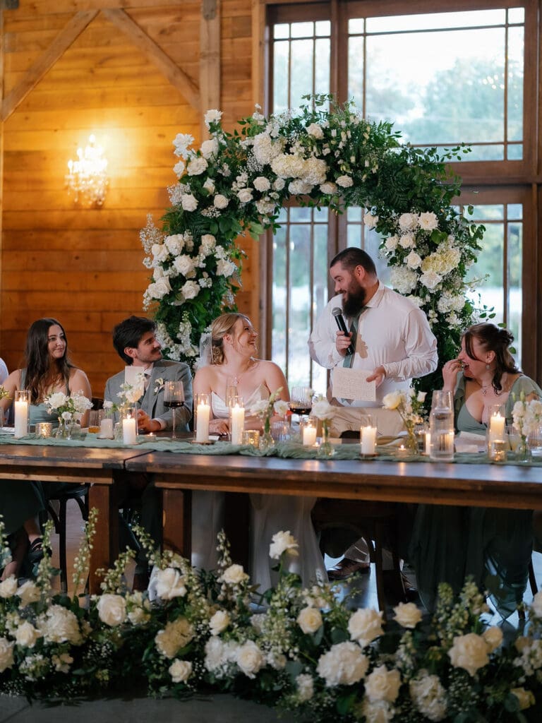 Wedding toasts and laughter during the Addison Grove reception
