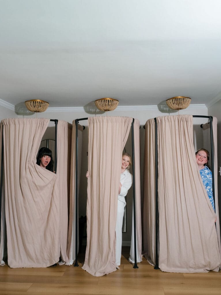 Bride Dana getting ready with her bridesmaids on her wedding morning