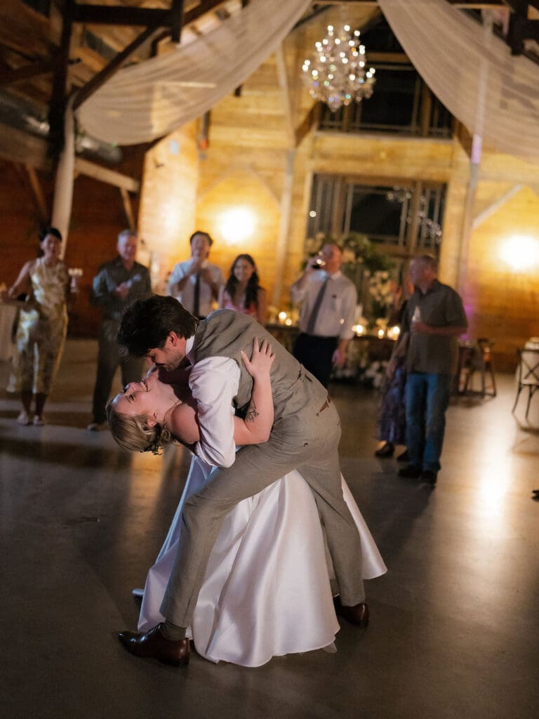 Dana and Jack dancing with guests on the wedding dance floor